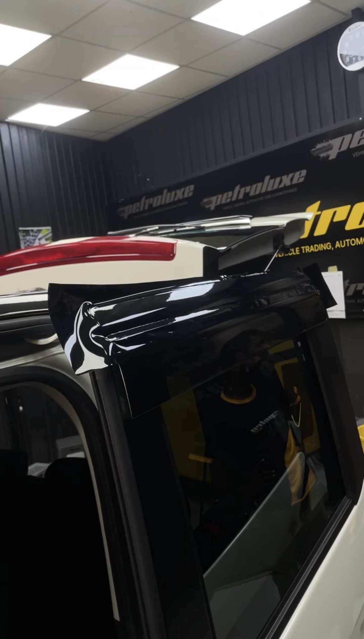 Mirror-gloss paintwork on a luxury car